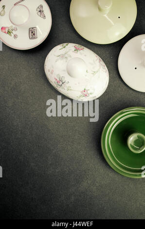 tea pot lids top view - copy space Stock Photo