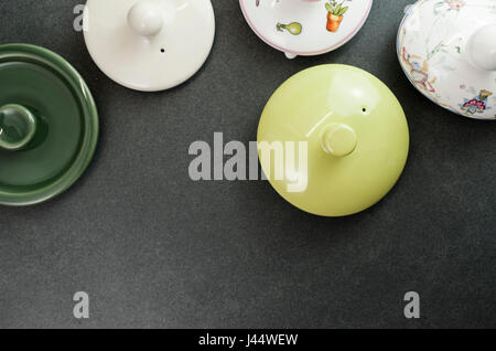 tea pot lids top view - copy space Stock Photo