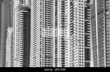 Black and white picture of modern buildings facades, architectural background. Stock Photo
