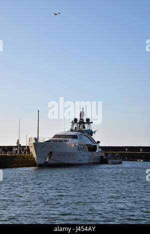 The beautiful Russian superyacht Lady M owned by Russian billionaire alexei Mordashov docked at historic Whitehaven harbour and marina Stock Photo