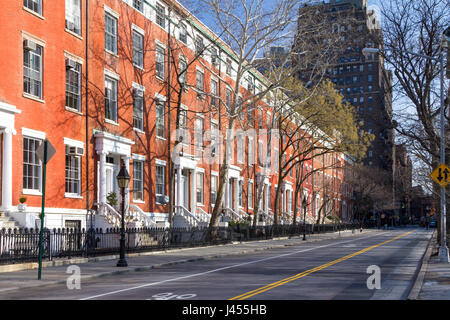 Block of historic buildings along an empty street along Washington Square Park in Manhattan, New York City NYC Stock Photo