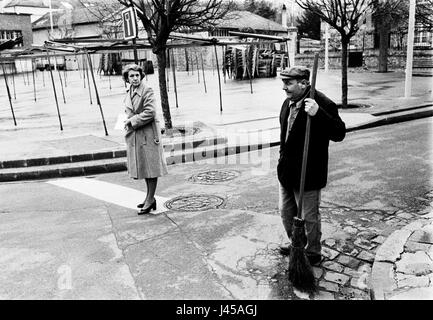 AJAXNETPHOTO. 1984. LOUVECIENNES, FRANCE. - MARKET SQUARE - SWEEPING UP. PHOTO:JONATHAN EASTLAND/AJAX REF:840104 12A Stock Photo