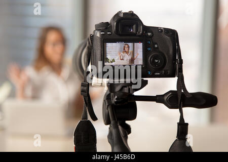 Recording business video on modern DSLR camera Stock Photo