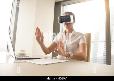 Photo of business woman working in virtual reality Stock Photo
