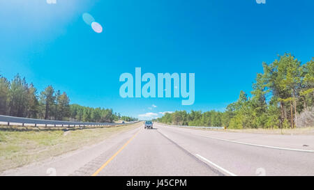 POV point of view - Driving South on interstate highway I25 in middle Spring. Stock Photo