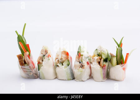 Spring rolls with vegetables served on a white background. isolated. Stock Photo