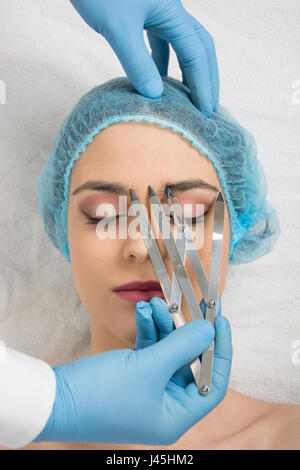 Preparation for the Japanese technique of drawing eyebrows Stock Photo