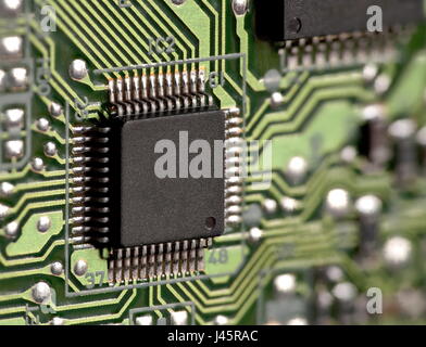 Integrated circuit on circuit board macro shot Stock Photo