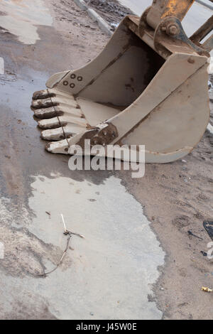 Dirty excavator bucket. Stock Photo