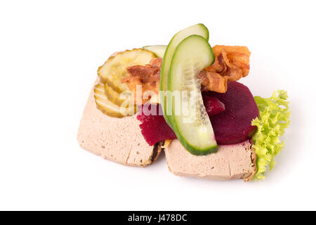 Danish specialties and national dishes, high-quality open sandwich, Liver Pate with bacon pickled cucumber, beetroot and cucumber isolated on white ba Stock Photo