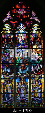 Stained Glass window in the Church of Saint Andrew in Antwerp, Belgium, depicting Mary and the Apostles at Pentecost Stock Photo