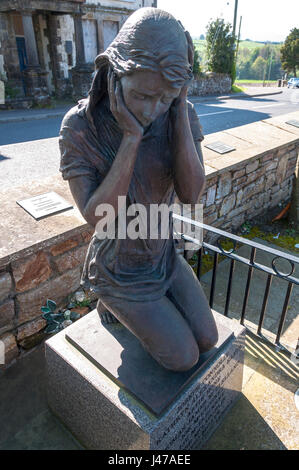 Memorial statue. The Claudy bombing occurred on 31 July 1972, when three car bombs exploded mid-morning on the Main Street of Claudy in County Londond Stock Photo