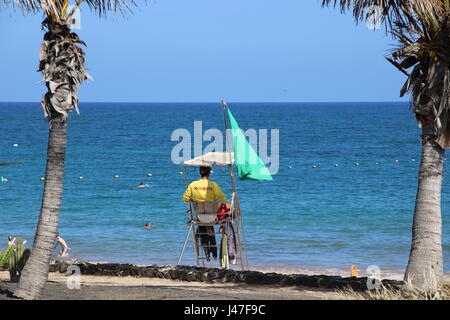 Lifeguard overlooking beach at Playa Las Cucharas, Costa Teguise, Lanzarote, Canary Islands, Spain Stock Photo