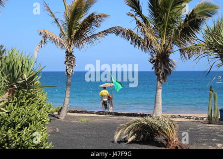 Lifeguard overlooking beach at Playa Las Cucharas, Costa Teguise, Lanzarote, Canary Islands, Spain Stock Photo