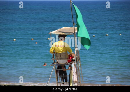 Lifeguard overlooking beach at Playa Las Cucharas, Costa Teguise, Lanzarote, Canary Islands, Spain Stock Photo