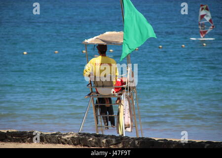 Lifeguard overlooking beach at Playa Las Cucharas, Costa Teguise, Lanzarote, Canary Islands, Spain Stock Photo