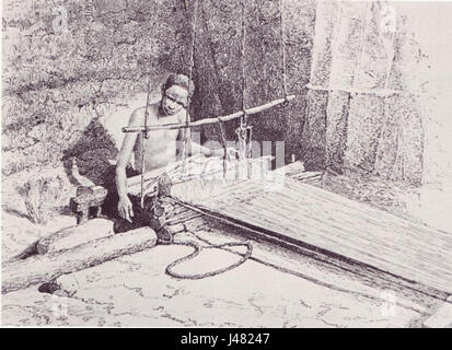 This image captures a weaver from Mogadishu in 1882, illustrating the traditional weaving practices in the region. The weaving culture in Mogadishu reflects the rich artisanal heritage of Somalia during the 19th century. Stock Photo