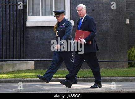 Chief of the Defence Staff Air Chief Marshal Sir Stuart Peach and Defence Secretary Sir Michael Fallon arriving at 10 Downing Street, London, as Nato general secretary Jens Stoltenberg visited for talks ahead of a summit meeting of Nato leaders in Brussels on May 25. Stock Photo