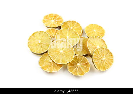 dried slices of lime fruits isolated on a white background Stock Photo