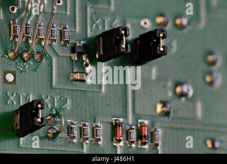 Electronic components on circuit board macro shot Stock Photo