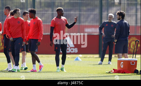 Manchester United's Paul Pogba (centre) during the training session at the AON Training Complex, Carrington. Stock Photo