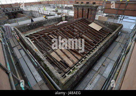 Work is undertaken at The Vyne, a National Trust property in Hampshire, which is undergoing a major restoration to it's roof. Visitors to the property can follow the progress of the £5.4m roof conservation project by viewing it from a new rooftop walkway. Stock Photo