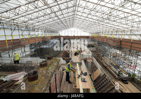 Work is undertaken at The Vyne, a National Trust property in Hampshire, which is undergoing a major restoration to it's roof. Visitors to the property can follow the progress of the £5.4m roof conservation project by viewing it from a new rooftop walkway. Stock Photo