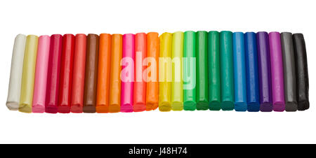 Colorful plasticine brick isolated on white Stock Photo