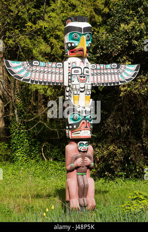 Thunderbird house post at Brockton Point in Stanley Park in Vancouver, Canada. Nine totem poles stand in the park and are British Columbia's most popu Stock Photo