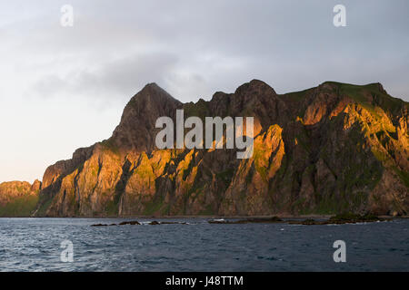 Cape Pankof On Unimak Island In The Pacific Ocean Near The Entrance To False Pass, Also Known As Isanotski Strait; Alaska, USA Stock Photo