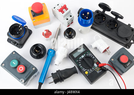 Electrical equipment and various tools on white background Stock Photo