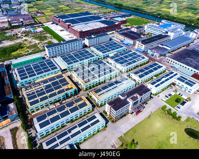 Cixi. 10th May, 2017. Aerial photo taken on May 10, 2017 shows solar panels on roofs in Cixi City, east China's Zhejiang Province. Credit: Xu Yu/Xinhua/Alamy Live News Stock Photo