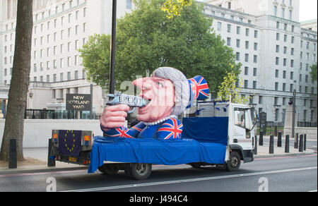 London, UK. 10th May, 2017. Theresa May anti Brexit float (made by the artist Jacques Tilly) touring London on 10th May passing New Scotland Yard. The float was originally made for the Düsseldorf Carnival but was donated to the original organiser of Unite for Europe march, Peter French.This was touring Credit: Bruce Tanner/Alamy Live News Stock Photo