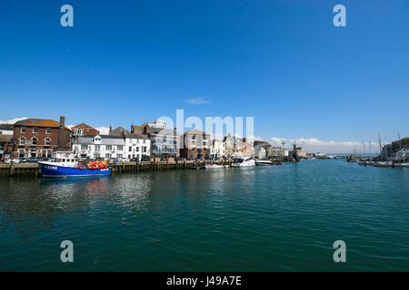 Weymouth, Dorset, UK. 11th May, 2017. UK Weather. The harbour under blue skies and warm sunshine at the seaside resort of Weymouth in Dorset. Photo Credit: Graham Hunt/Alamy Live News Stock Photo