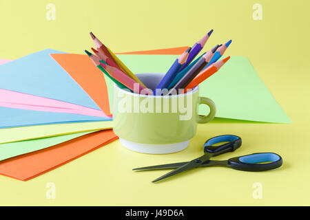 children's creativity, pencils, scissors, colored paper, there is a place for text Stock Photo