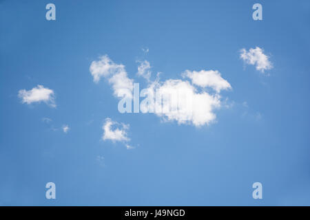 white clouds in the blu summer sky Stock Photo
