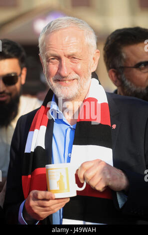 Labour leader Jeremy Corbyn wears a Rotherham United scarf after making a speech on the general election campaign trail in Rotherham. Stock Photo