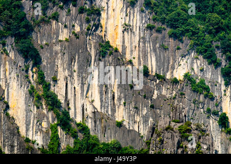 HA LONG BAY, VIETNAM - CIRCA SEPTEMBER 2014:  Detail of  limestone karsts from one of the thousand islands on Ha Long Bay in Vietnam, a popular touris Stock Photo