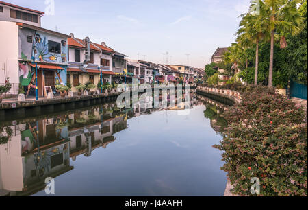 Colourful houses on the river bank in the old town of Melaka, Malaysia Stock Photo