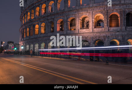 Colosseum at night with traffic light trails, Rome, Italy. Stock Photo