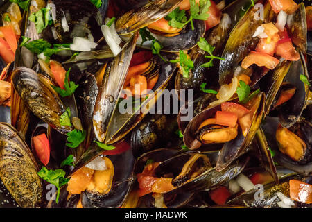 Closeup of marinara mussels, shot from above Stock Photo