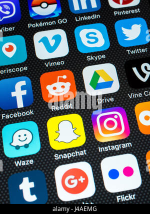 Social media icons on iphone screen Stock Photo