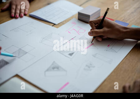 Hands Writing Drawing on Idea Paper Working Stock Photo