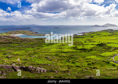 Panoramic view over Bealtra Bay on south coast of Iveragh Peninsula, nearby villages Derrynane and Caherdaniel, County Kerry, Ireland Stock Photo