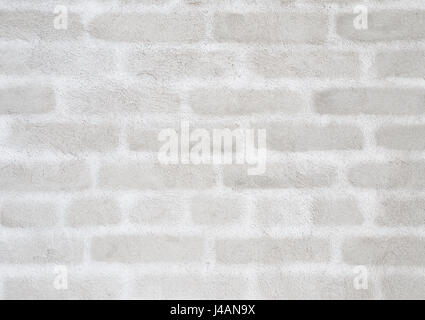 Plastered wall on which silhouettes of bricks are seen. Building background. Stock Photo
