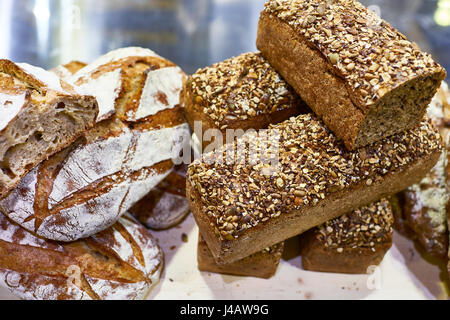 Fresh bread with seeds and grains closeup Stock Photo
