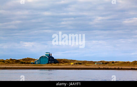 The old lifeboat station at Blakeney Point an area of outstanding natural beauty on the North Norfolk coast in eastern England UK Stock Photo