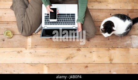 Woman using laptop top view web header mockup Stock Photo