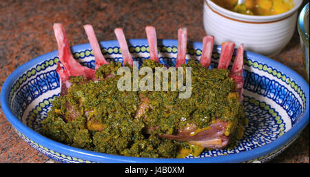 A rack of lamb coated with mustard and breaded mint crust Stock Photo