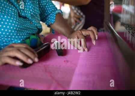 Weavers hands.  Silk Island, Cambodia Stock Photo